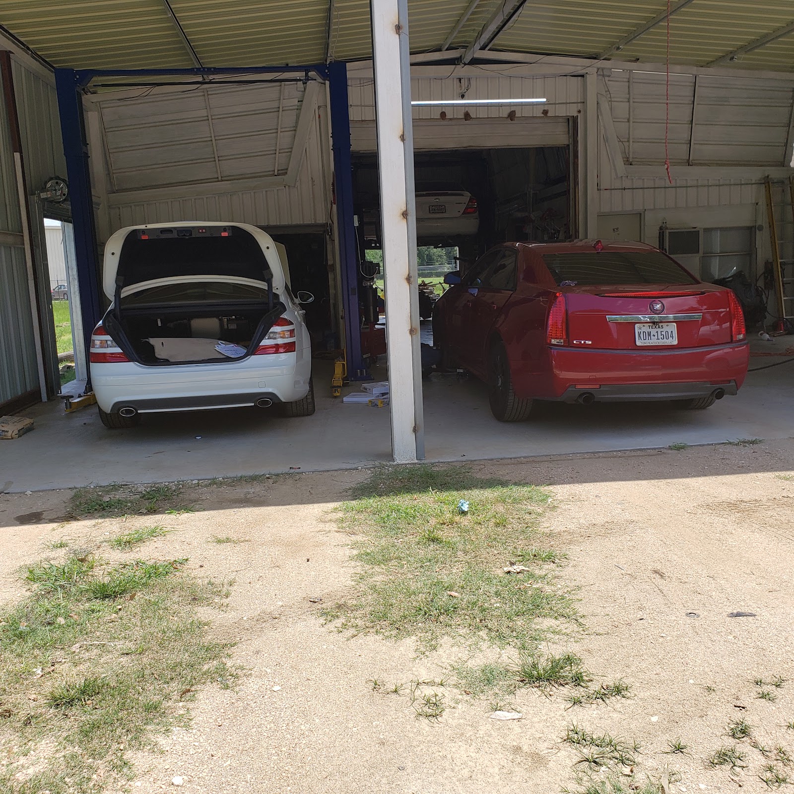 Virk Auto Service LLC vehicle on a lift